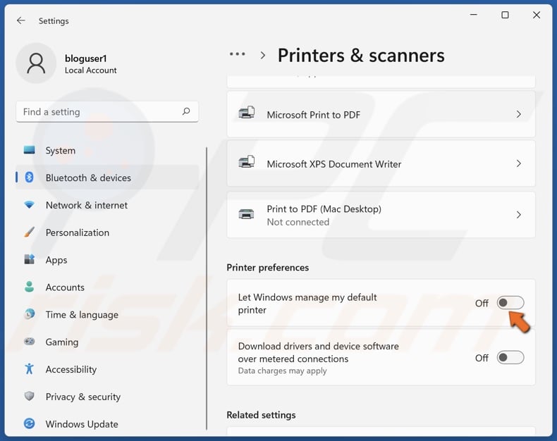 Disable the Let Windows manage my default printer option