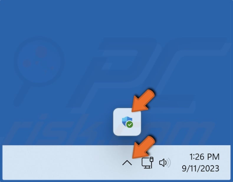 Open the icons tray in the taskbar and click the Windows Security icon