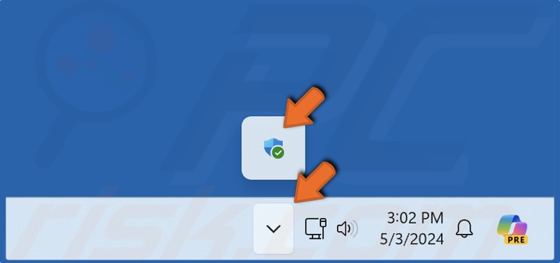 Navigate to the icons tray in the taskbar and open Windows Security